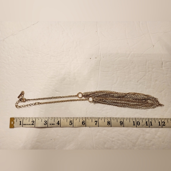 Kenneth Cole Multi-Layer Waterfall Silver and Light Gold Toned Necklace - Picture 2 of 3